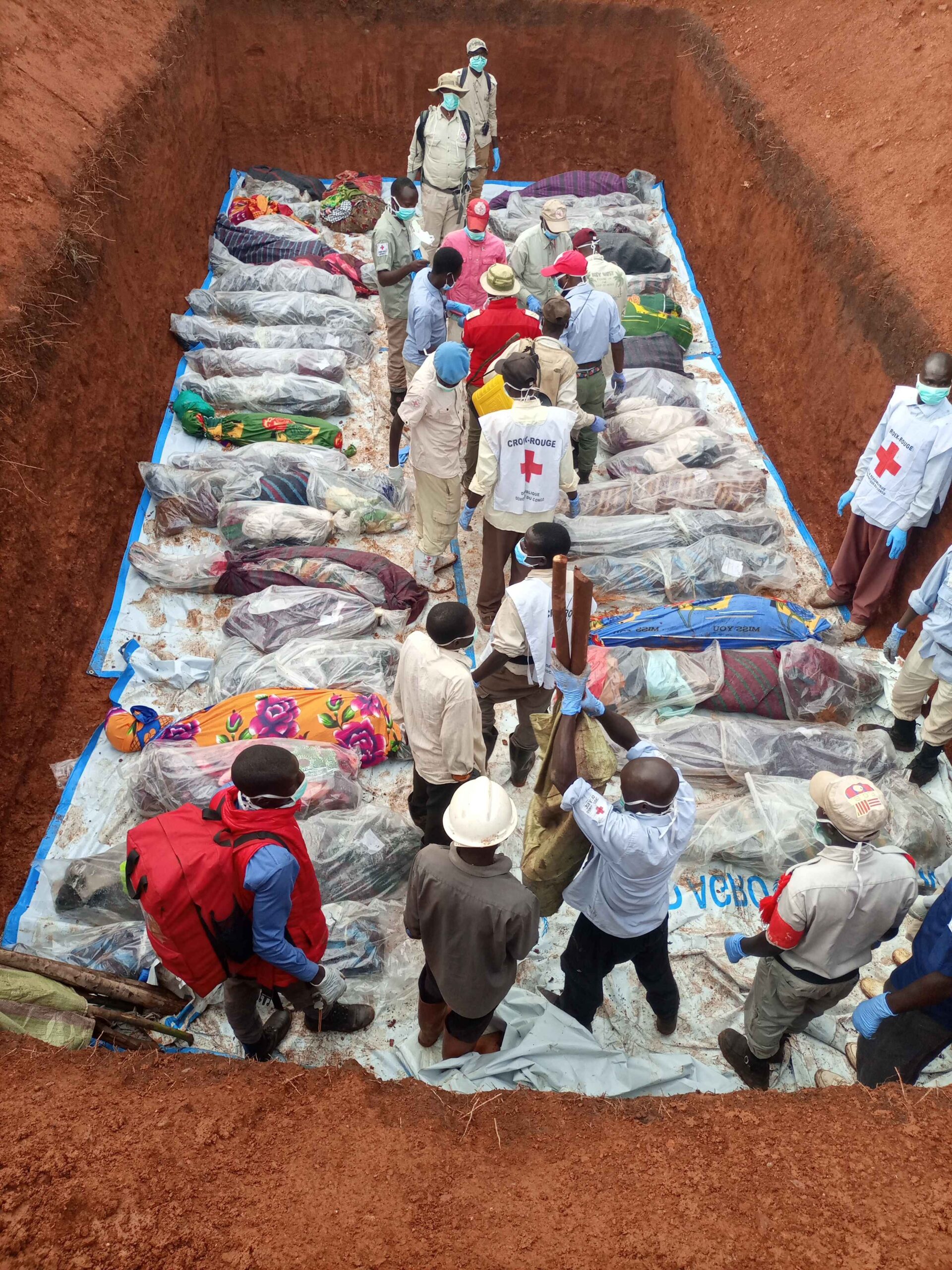 Most of the dead were buried in a mass grave two days after the attack near Lala camp Ituri province DRC June 2023. 2023 Photo HRW Private scaled
